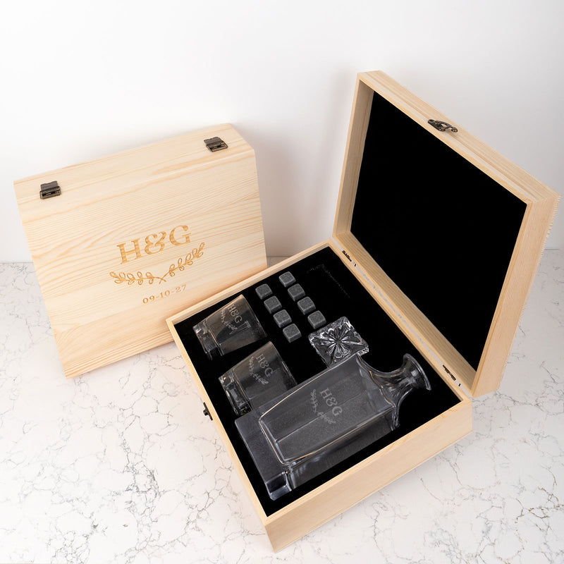 Unique anniversary gift featuring a personalised decanter set in an engraved wooden gift box with matching scotch glasses and whiskey stones