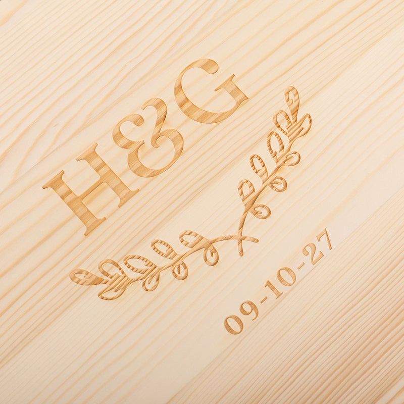 Professionally laser engraved whiskey decanter set with names and date, a unique anniversary gift presented in a rustic wooden gift box