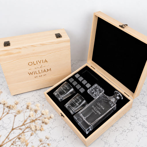 Personalised wedding whiskey decanter gift set with 870ml decanter, two engraved glasses and whiskey stones presented in a wooden gift box.