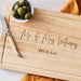 Custom anniversary cheese board made from natural wood, perfect for serving or display.