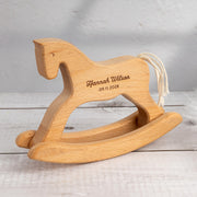 Wooden rocking horse toy with woven cord tail natural finish and timeless design