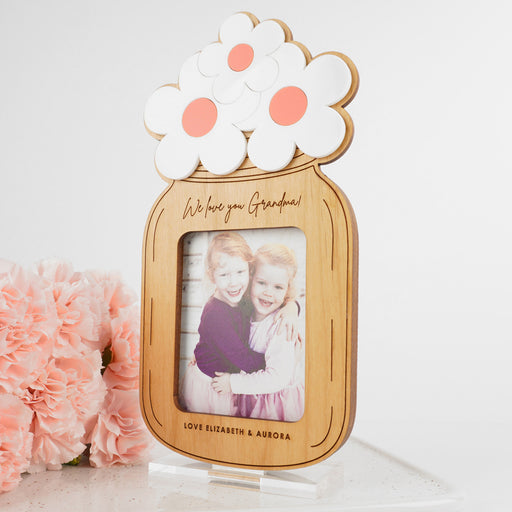 Personalised wooden mason jar with printed photo and acrylic flowers on a clear acrylic stand