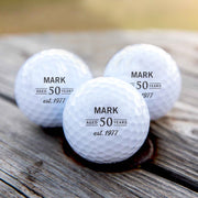 Personalised golf balls in a black gift box, custom printed with initials – perfect birthday gift for a golf lover.