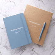 Custom light blue A5 notebook and matching pen gift set personalised with a white printed design