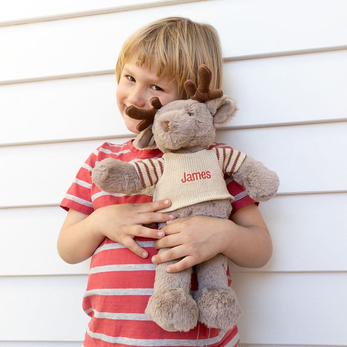 40cm reindeer with velvet antlers and a huggable design, made for Christmas cuddles.