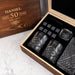 Custom engraved scotch glass set with initials, whiskey stones, and decanter in a wooden gift box for whiskey lovers