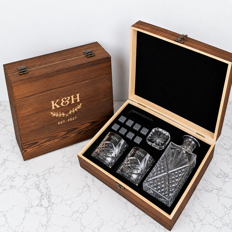 Personalised wedding whiskey gift set with 870ml decanter, two engraved scotch glasses and reusable whiskey stones in a rustic wooden gift box.