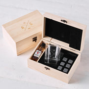 Personalised whiskey gift set in engraved wooden box with scotch glass, whiskey stones, and mini spirit bottle.