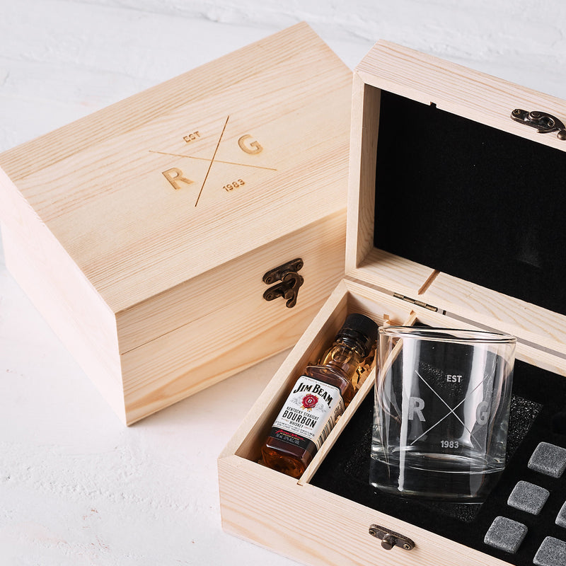 Premium personalised whiskey box featuring mini spirit bottle, stones, and engraved glass gift for him.