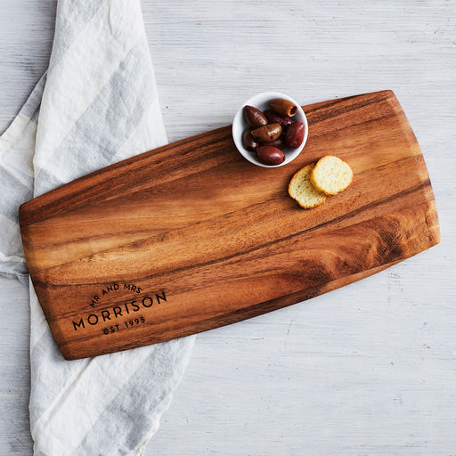 Personalised walnut wood tapas board for Valentine’s Day with engraved names and message