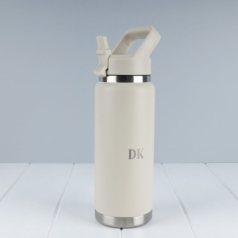 Stone personalised insulated water bottle with custom laser engraving and carry handle.