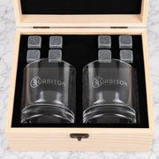 Premium corporate whiskey set with personalised glasses and company logo engraved on a wooden gift box, perfect for clients and colleagues.