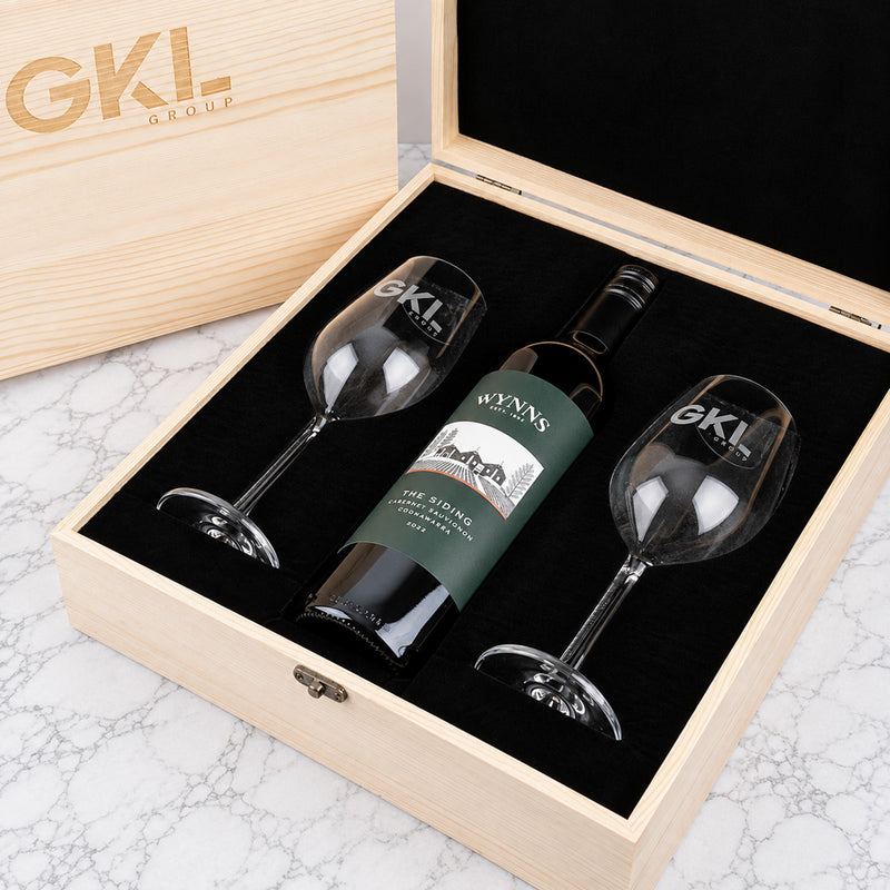 Branded wooden wine gift box with personalised wine glasses and choice of Cabernet Sauvignon or Sauvignon Blanc for clients and staff.