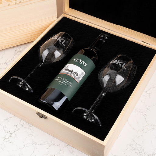 Wine glass set in wooden presentation box with custom laser engraving for clients or employees