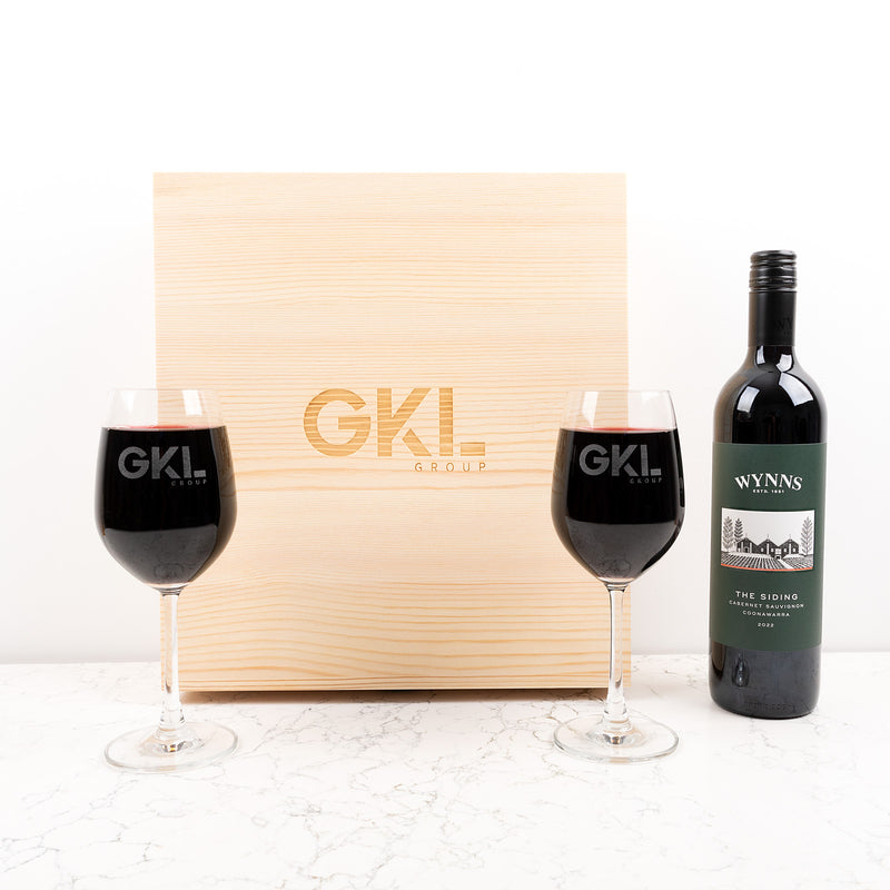 Custom engraved wine glass set with company name or logo, perfect for client or supplier appreciation