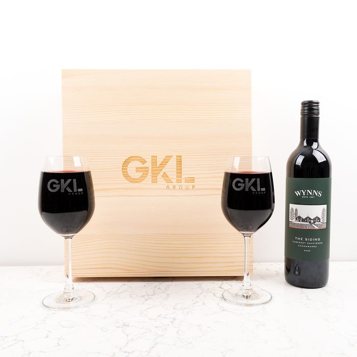 Custom engraved wine glass set with company name or logo, perfect for client or supplier appreciation