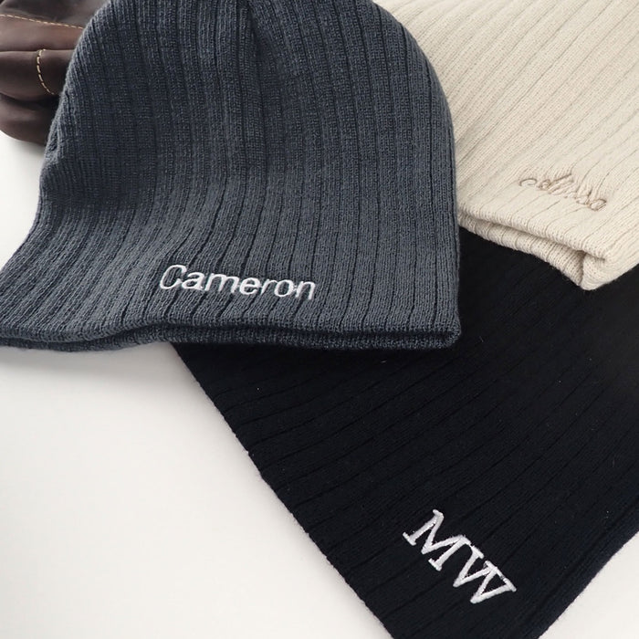 Embroidered cable knit beanie hat with personalised name