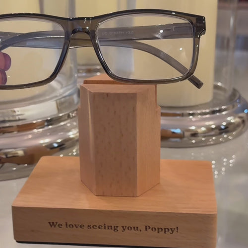 Personalised wooden reading glasses stand with engraved name and natural beech wood finish