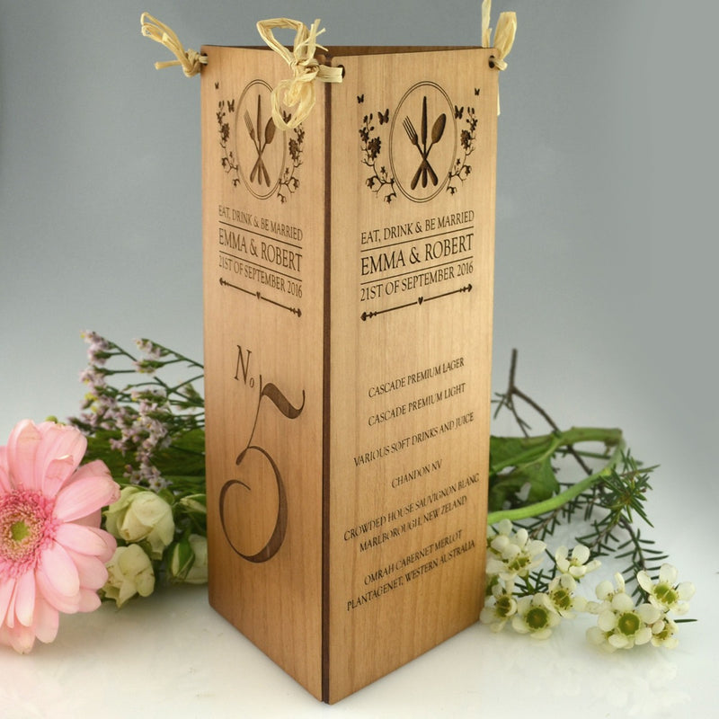 Custom designed laser engraved wedding reception wooden menu and table number centrepiece