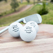 Custom golf ball favours with optional organza bags for table display
