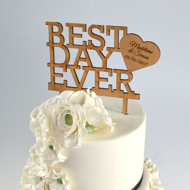 Natural wood Best Day Ever wedding cake topper engraved with bride and groom’s names and date